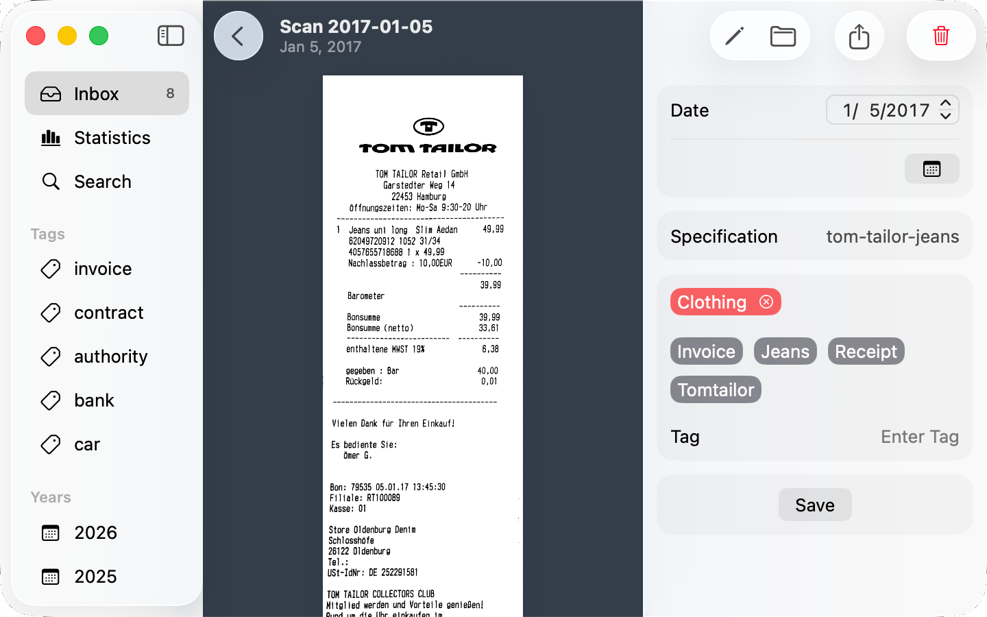 Tagging a scanned receipt on a Mac: the document beside its date, description and tags